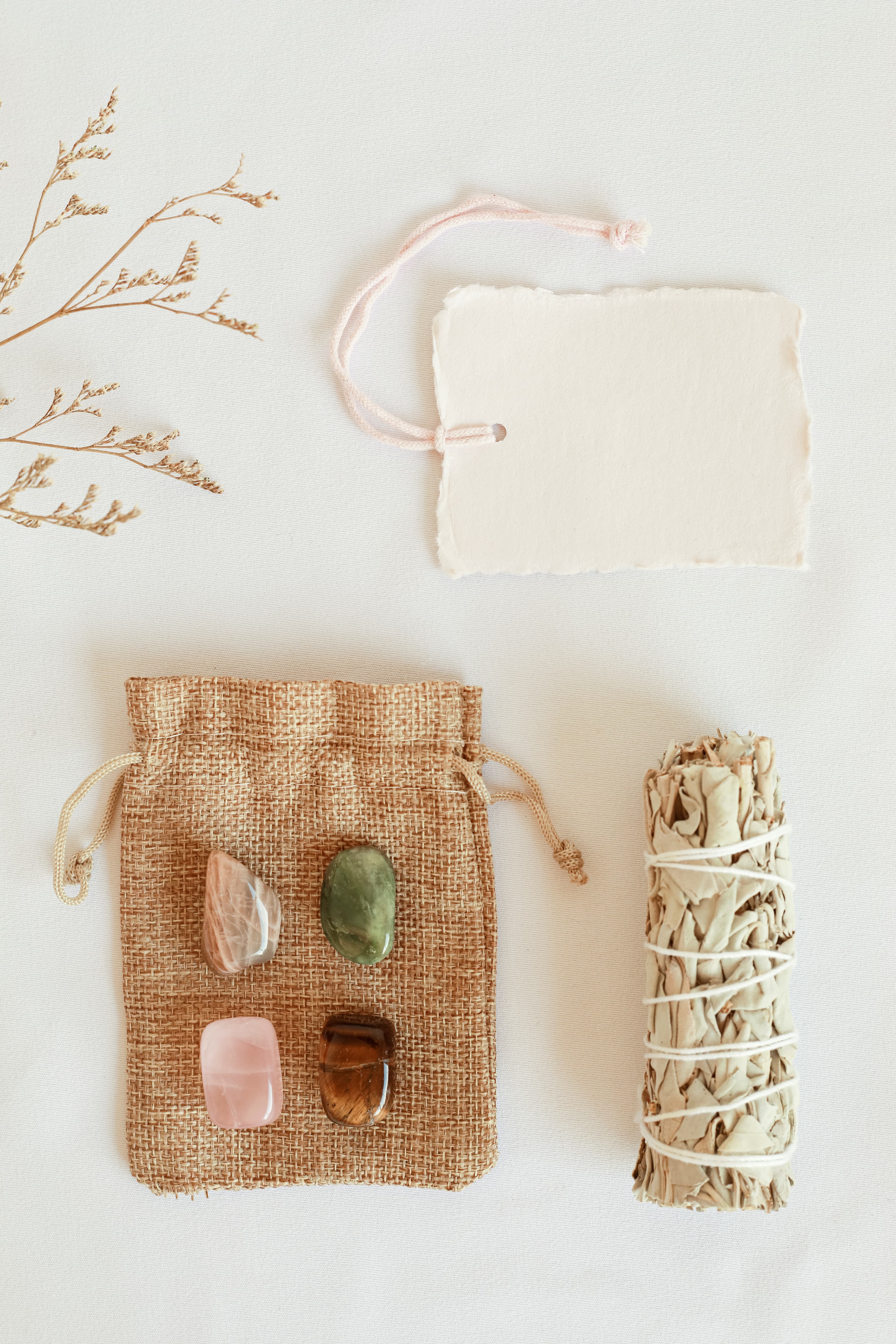 Recovery ritual products arranged with crystal and sage