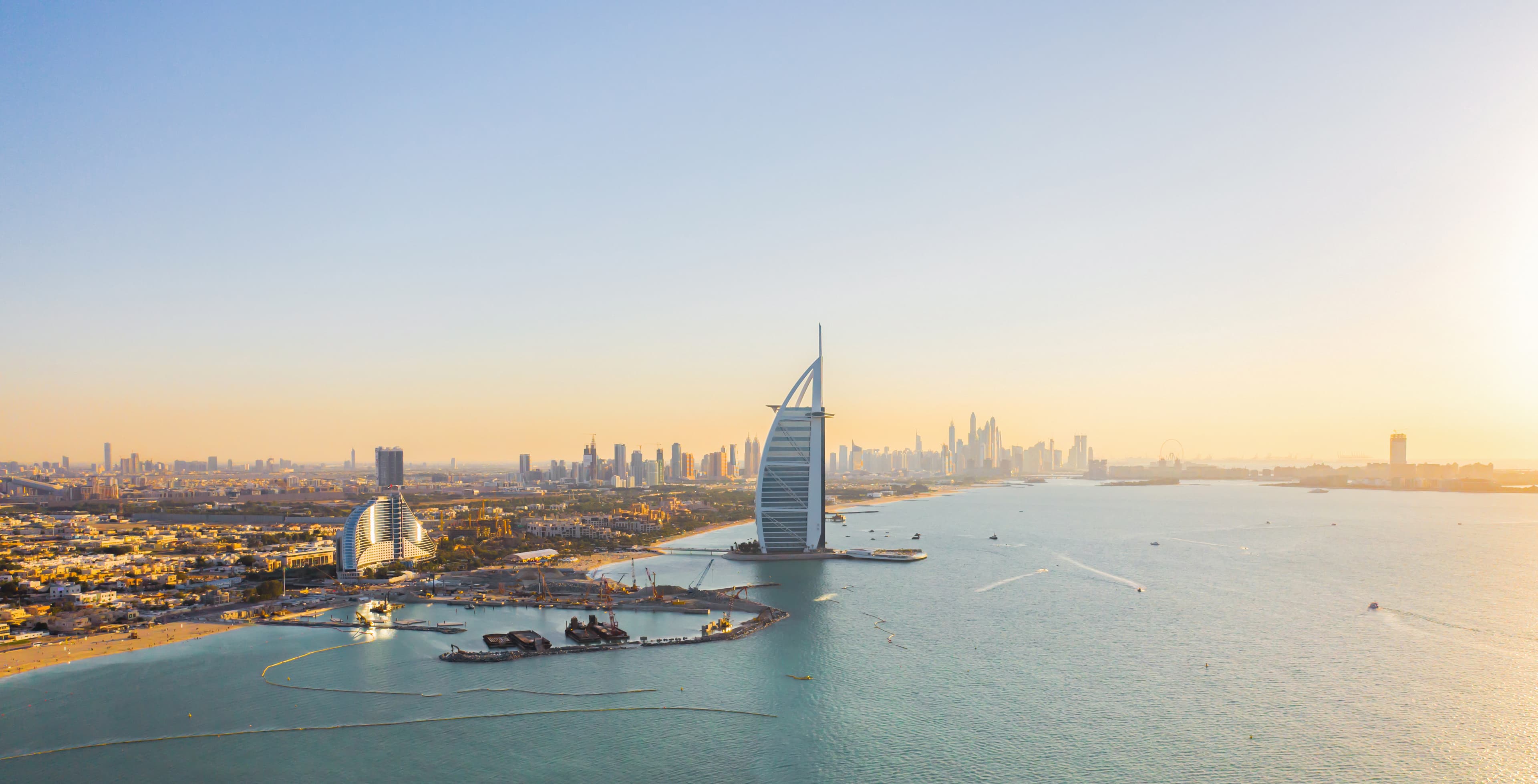 Dubai skyline at sunset over the waterfront
